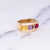 Vintage 1980s Gold Band Ring with Pink, Amethyst, and Yellow CZs
