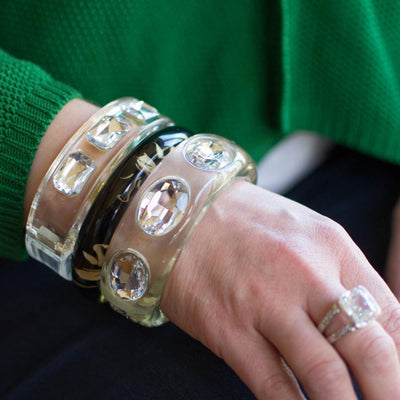 Clear Lucite Hinged Bangle Bracelet with huge channel set rhinestones by Lucite - Vintage Meet Modern Vintage Jewelry - Chicago, Illinois - #oldhollywoodglamour #vintagemeetmodern #designervintage #jewelrybox #antiquejewelry #vintagejewelry