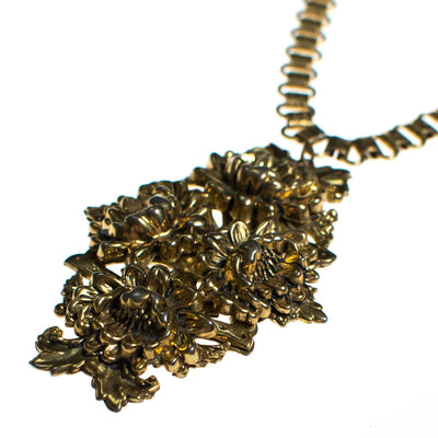 Vintage 1940s Repousse Gold Floral Pendant Neckalce with Book Chain by 1940s - Vintage Meet Modern Vintage Jewelry - Chicago, Illinois - #oldhollywoodglamour #vintagemeetmodern #designervintage #jewelrybox #antiquejewelry #vintagejewelry