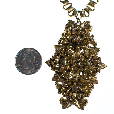 Vintage 1940s Repousse Gold Floral Pendant Neckalce with Book Chain by 1940s - Vintage Meet Modern Vintage Jewelry - Chicago, Illinois - #oldhollywoodglamour #vintagemeetmodern #designervintage #jewelrybox #antiquejewelry #vintagejewelry