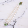 Vintage Double Strand Faux Pearl Bracelet with Green Rhinestone Clasp by Unsigned - Vintage Meet Modern Vintage Jewelry - Chicago, Illinois - #oldhollywoodglamour #vintagemeetmodern #designervintage #jewelrybox #antiquejewelry #vintagejewelry