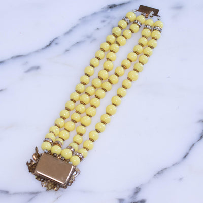 Vintage Yellow Four Strand Bead Bracelet with Decorative Clasp by Unsigned (possibly House of Schrager or Jonne) - Vintage Meet Modern Vintage Jewelry - Chicago, Illinois - #oldhollywoodglamour #vintagemeetmodern #designervintage #jewelrybox #antiquejewelry #vintagejewelry