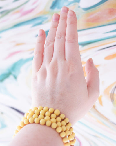 Vintage Yellow Four Strand Bead Bracelet with Decorative Clasp by Unsigned (possibly House of Schrager or Jonne) - Vintage Meet Modern Vintage Jewelry - Chicago, Illinois - #oldhollywoodglamour #vintagemeetmodern #designervintage #jewelrybox #antiquejewelry #vintagejewelry