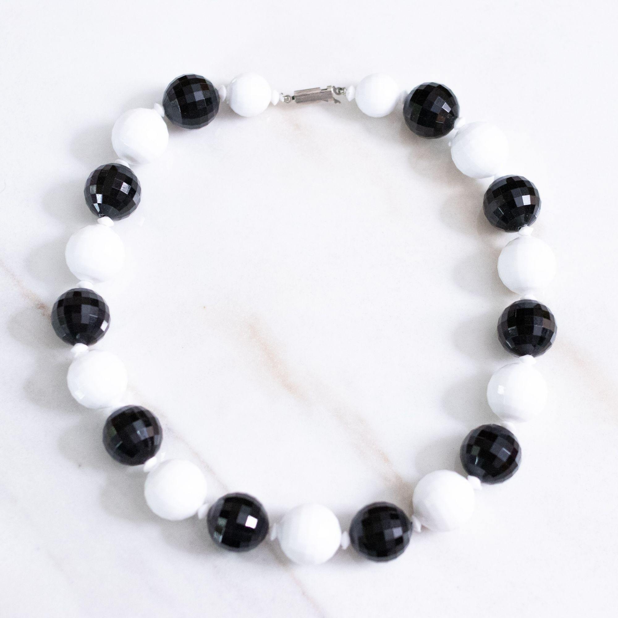 Vintage Chunky Faceted Black and White Lucite Beaded Necklace by Made in Hong Kong - Vintage Meet Modern Vintage Jewelry - Chicago, Illinois - #oldhollywoodglamour #vintagemeetmodern #designervintage #jewelrybox #antiquejewelry #vintagejewelry