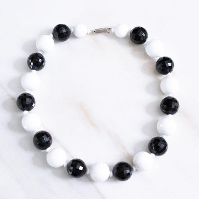Vintage Chunky Faceted Black and White Lucite Beaded Necklace by Made in Hong Kong - Vintage Meet Modern Vintage Jewelry - Chicago, Illinois - #oldhollywoodglamour #vintagemeetmodern #designervintage #jewelrybox #antiquejewelry #vintagejewelry