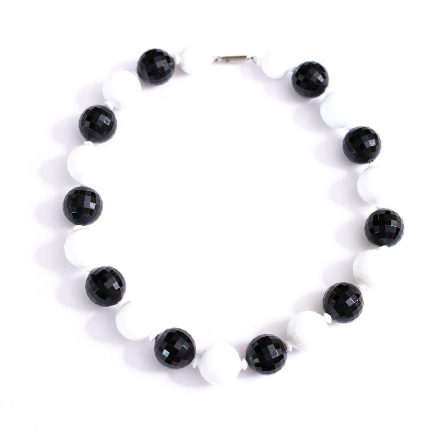 Vintage Chunky Faceted Black and White Lucite Beaded Necklace by Made in Hong Kong - Vintage Meet Modern Vintage Jewelry - Chicago, Illinois - #oldhollywoodglamour #vintagemeetmodern #designervintage #jewelrybox #antiquejewelry #vintagejewelry