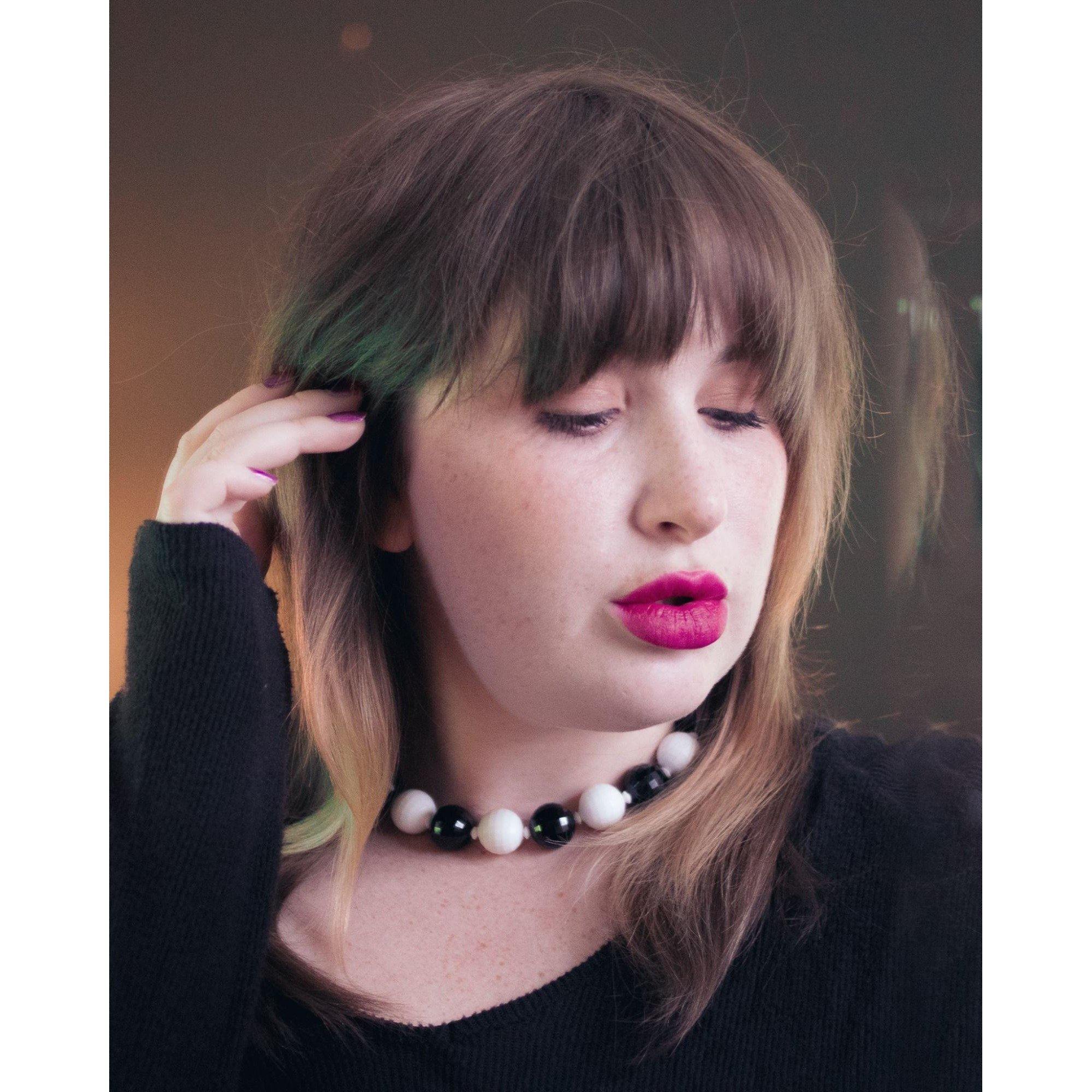 Vintage Chunky Faceted Black and White Lucite Beaded Necklace by Made in Hong Kong - Vintage Meet Modern Vintage Jewelry - Chicago, Illinois - #oldhollywoodglamour #vintagemeetmodern #designervintage #jewelrybox #antiquejewelry #vintagejewelry