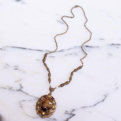 Vintage West Germany Medallion Necklace with Tigers Eye Glass by West Germany - Vintage Meet Modern Vintage Jewelry - Chicago, Illinois - #oldhollywoodglamour #vintagemeetmodern #designervintage #jewelrybox #antiquejewelry #vintagejewelry