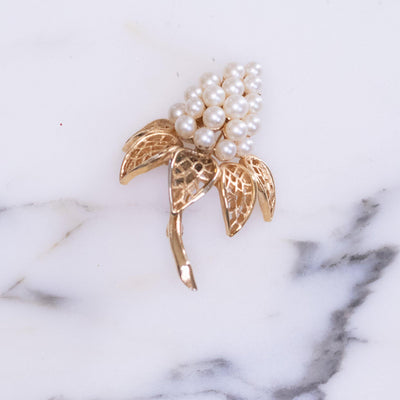 Vintage Crown Trifari Flower Brooch with Faux Pearls by Vintage Meet Modern - Vintage Meet Modern Vintage Jewelry - Chicago, Illinois - #oldhollywoodglamour #vintagemeetmodern #designervintage #jewelrybox #antiquejewelry #vintagejewelry