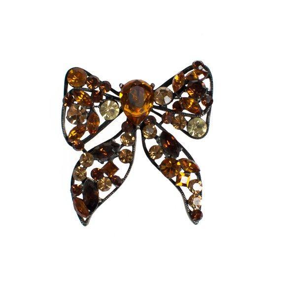 Vintage Rhinestone Bow Brooch Amber, Citrine, Golden Yellow Rhinestones Black Japanned Metal Setting by 1960s - Vintage Meet Modern Vintage Jewelry - Chicago, Illinois - #oldhollywoodglamour #vintagemeetmodern #designervintage #jewelrybox #antiquejewelry #vintagejewelry