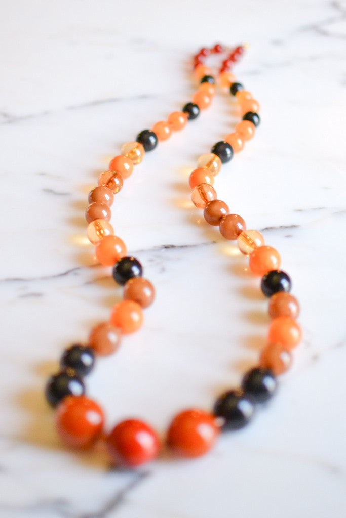 Orange, Black, Brown Lucite Bubble Bead Retro Necklace by 1960s Vintage - Vintage Meet Modern Vintage Jewelry - Chicago, Illinois - #oldhollywoodglamour #vintagemeetmodern #designervintage #jewelrybox #antiquejewelry #vintagejewelry