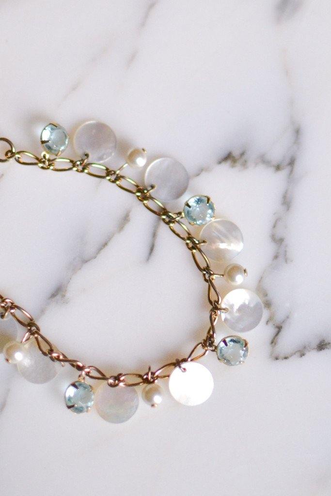 Mother of Pearl and Blue Crystal Charm Bracelet by 1970s - Vintage Meet Modern Vintage Jewelry - Chicago, Illinois - #oldhollywoodglamour #vintagemeetmodern #designervintage #jewelrybox #antiquejewelry #vintagejewelry