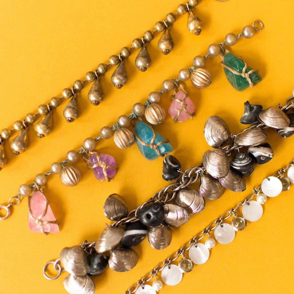 Mother of Pearl and Blue Crystal Charm Bracelet by 1970s - Vintage Meet Modern Vintage Jewelry - Chicago, Illinois - #oldhollywoodglamour #vintagemeetmodern #designervintage #jewelrybox #antiquejewelry #vintagejewelry