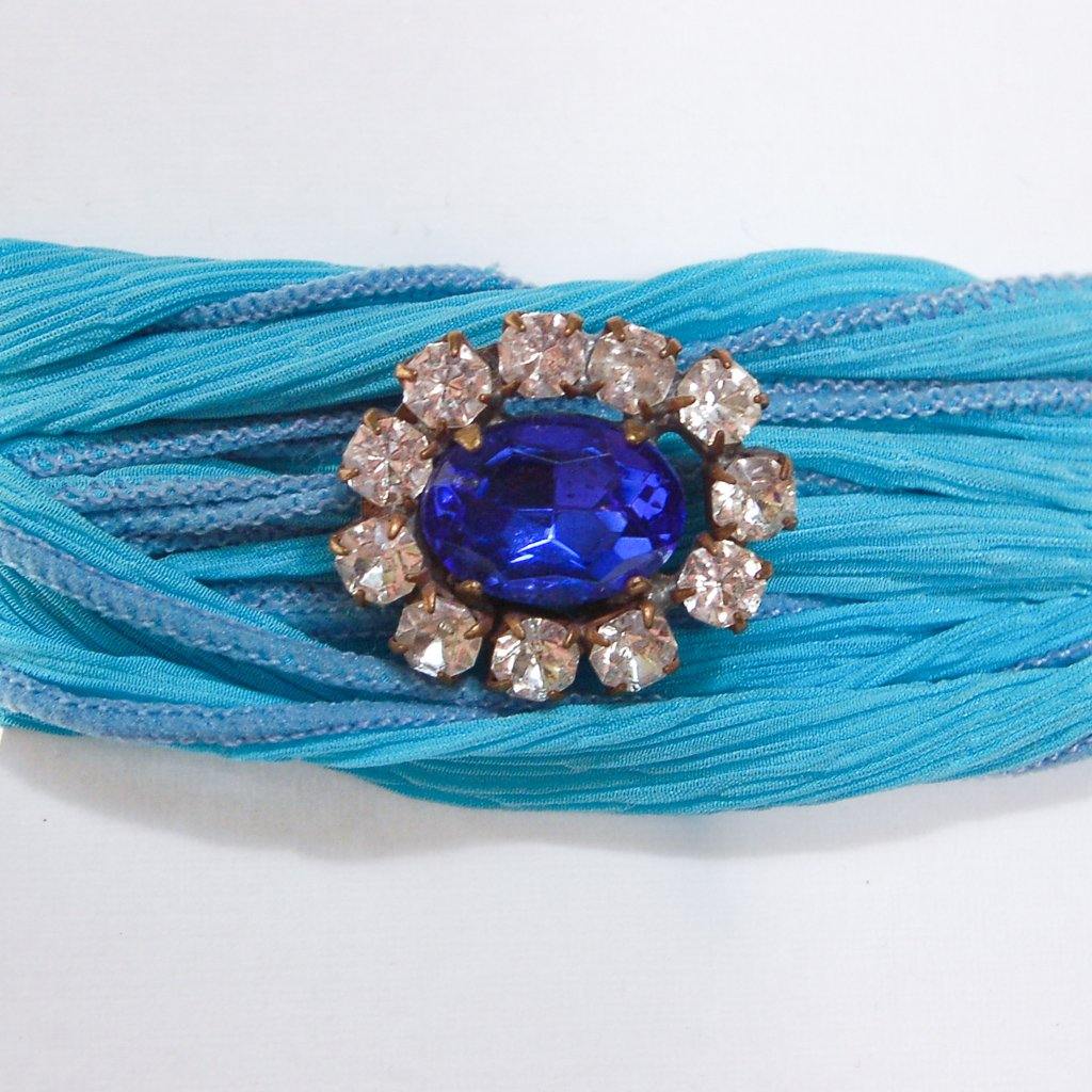 Turquoise Ribbon Wrap Bracelet with Sapphire Blue and Diamante Rhinestone Button by Vintage Meet Modern - Vintage Meet Modern Vintage Jewelry - Chicago, Illinois - #oldhollywoodglamour #vintagemeetmodern #designervintage #jewelrybox #antiquejewelry #vintagejewelry