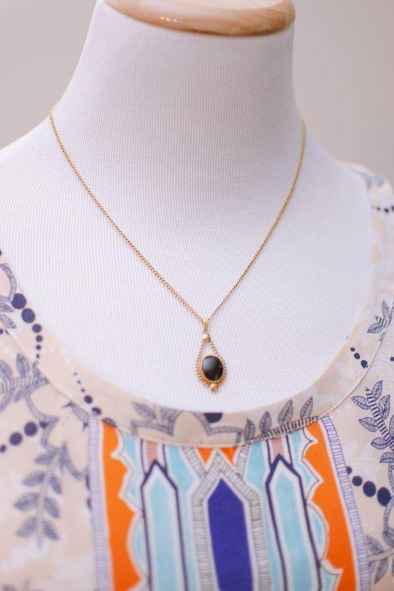 Vintage 1940s Jet Black Glass Cabochon Petite Dainty Pendant Necklace Gold Filled by 1940s - Vintage Meet Modern Vintage Jewelry - Chicago, Illinois - #oldhollywoodglamour #vintagemeetmodern #designervintage #jewelrybox #antiquejewelry #vintagejewelry