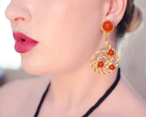 Vintage Avon Gold Scroll Statement Earrings with Carnelian Lucite Cabochons by Avon - Vintage Meet Modern Vintage Jewelry - Chicago, Illinois - #oldhollywoodglamour #vintagemeetmodern #designervintage #jewelrybox #antiquejewelry #vintagejewelry