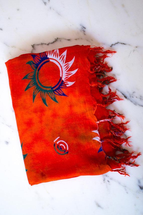 Vintage Orange Scarf, Wrap with Blue, White, and Green Sun Shapes, Large Scarf Shawl by 1980s - Vintage Meet Modern Vintage Jewelry - Chicago, Illinois - #oldhollywoodglamour #vintagemeetmodern #designervintage #jewelrybox #antiquejewelry #vintagejewelry