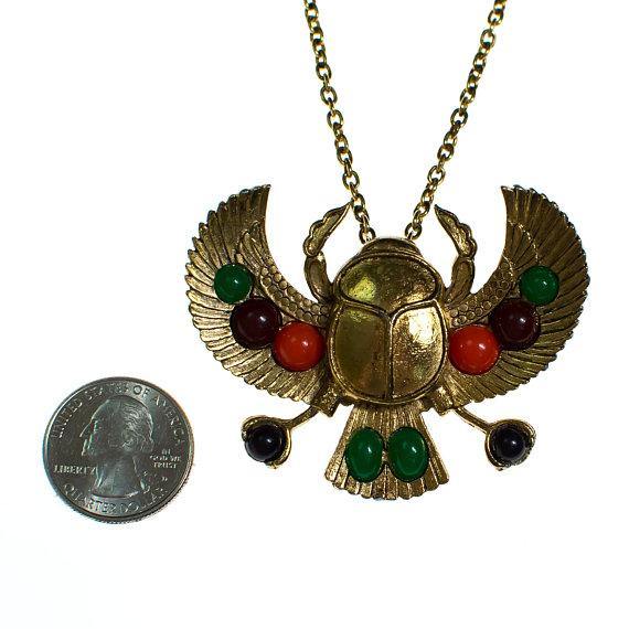 Gold tone Tutankhamun Winged Falcon Scarab Statement Necklace by Falcon Scarab - Vintage Meet Modern Vintage Jewelry - Chicago, Illinois - #oldhollywoodglamour #vintagemeetmodern #designervintage #jewelrybox #antiquejewelry #vintagejewelry