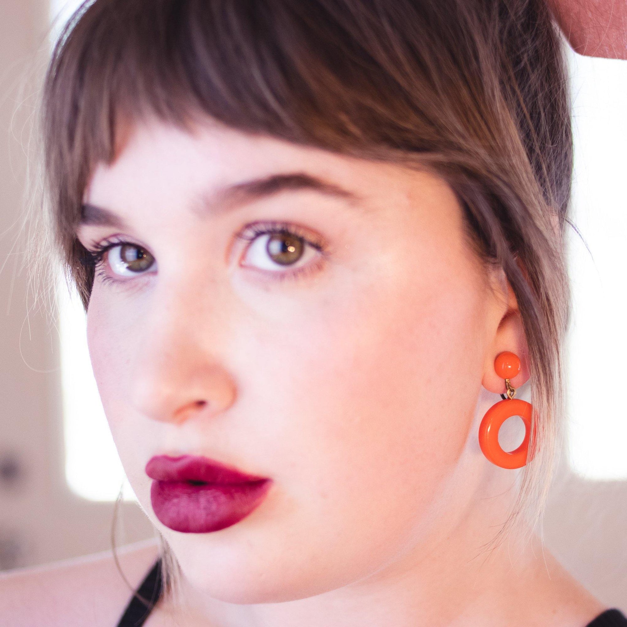Vintage Orange Lucite Door Knocker Earrings by Unsigned Beauty - Vintage Meet Modern Vintage Jewelry - Chicago, Illinois - #oldhollywoodglamour #vintagemeetmodern #designervintage #jewelrybox #antiquejewelry #vintagejewelry