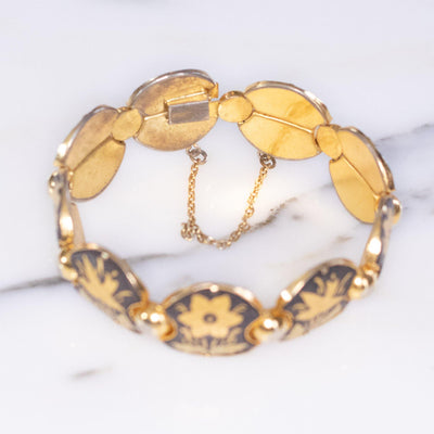 Vintage Damascene Gold and Black Round Panel Link Bracelet with Flowers and Birds by Made in Spain - Vintage Meet Modern Vintage Jewelry - Chicago, Illinois - #oldhollywoodglamour #vintagemeetmodern #designervintage #jewelrybox #antiquejewelry #vintagejewelry