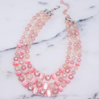 Vintage Pink and Faux Pearl Triple Strand Necklace by Japan - Vintage Meet Modern Vintage Jewelry - Chicago, Illinois - #oldhollywoodglamour #vintagemeetmodern #designervintage #jewelrybox #antiquejewelry #vintagejewelry