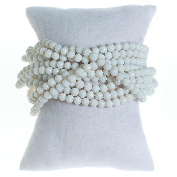 Vintage Ciner White Multi Strand Beaded Bracelet with Gold Clasp by 1970s - Vintage Meet Modern Vintage Jewelry - Chicago, Illinois - #oldhollywoodglamour #vintagemeetmodern #designervintage #jewelrybox #antiquejewelry #vintagejewelry