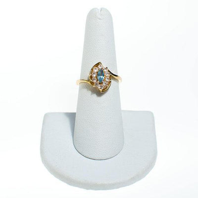 Vintage Blue Topaz Crystal Statement Ring Princess Setting Marquise Cut Center Stone Gold Plated Ring Size 7.25 by 1980s - Vintage Meet Modern Vintage Jewelry - Chicago, Illinois - #oldhollywoodglamour #vintagemeetmodern #designervintage #jewelrybox #antiquejewelry #vintagejewelry