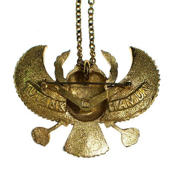 Gold tone Tutankhamun Winged Falcon Scarab Statement Necklace by Falcon Scarab - Vintage Meet Modern Vintage Jewelry - Chicago, Illinois - #oldhollywoodglamour #vintagemeetmodern #designervintage #jewelrybox #antiquejewelry #vintagejewelry