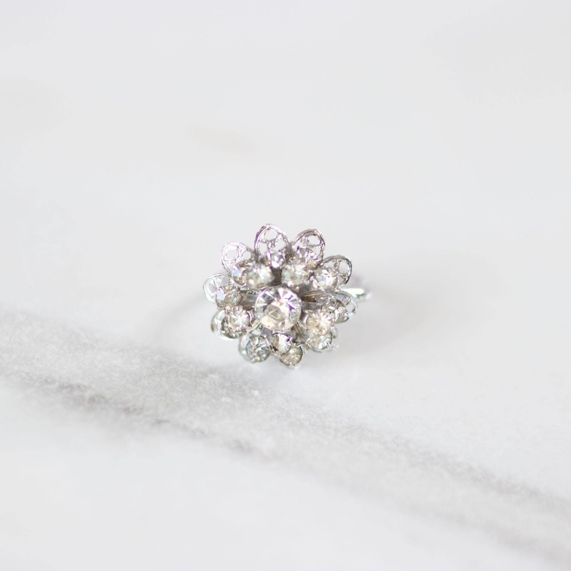 Vintage Sarah Coventry Filigree Snowflake Ring with Diamante Rhinestones by Sarah Coventry - Vintage Meet Modern Vintage Jewelry - Chicago, Illinois - #oldhollywoodglamour #vintagemeetmodern #designervintage #jewelrybox #antiquejewelry #vintagejewelry