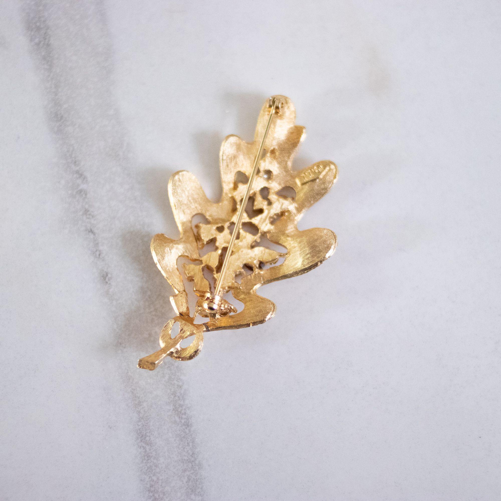 Vintage Gold Leaf and Red Rhinestone Brooch by JJ - Vintage Meet Modern Vintage Jewelry - Chicago, Illinois - #oldhollywoodglamour #vintagemeetmodern #designervintage #jewelrybox #antiquejewelry #vintagejewelry