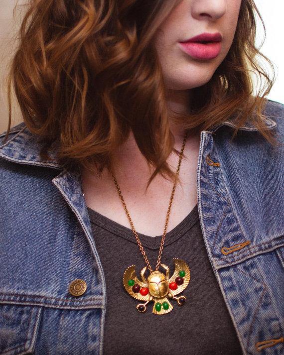 Gold tone Tutankhamun Winged Falcon Scarab Statement Necklace by Falcon Scarab - Vintage Meet Modern Vintage Jewelry - Chicago, Illinois - #oldhollywoodglamour #vintagemeetmodern #designervintage #jewelrybox #antiquejewelry #vintagejewelry