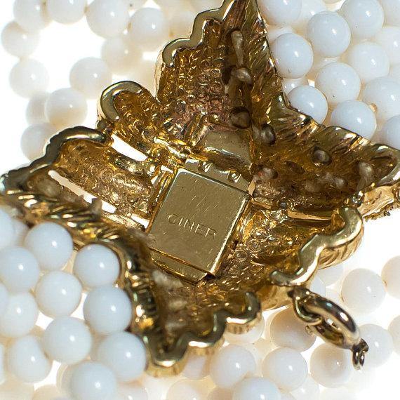 Vintage Ciner White Multi Strand Beaded Bracelet with Gold Clasp by 1970s - Vintage Meet Modern Vintage Jewelry - Chicago, Illinois - #oldhollywoodglamour #vintagemeetmodern #designervintage #jewelrybox #antiquejewelry #vintagejewelry
