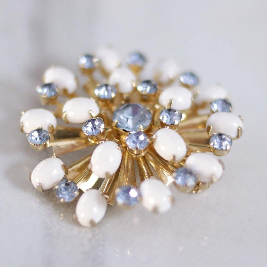 Vintage Milk Glass and Blue Rhinestone Pinwheel Brooch by Unsigned Beauty - Vintage Meet Modern Vintage Jewelry - Chicago, Illinois - #oldhollywoodglamour #vintagemeetmodern #designervintage #jewelrybox #antiquejewelry #vintagejewelry