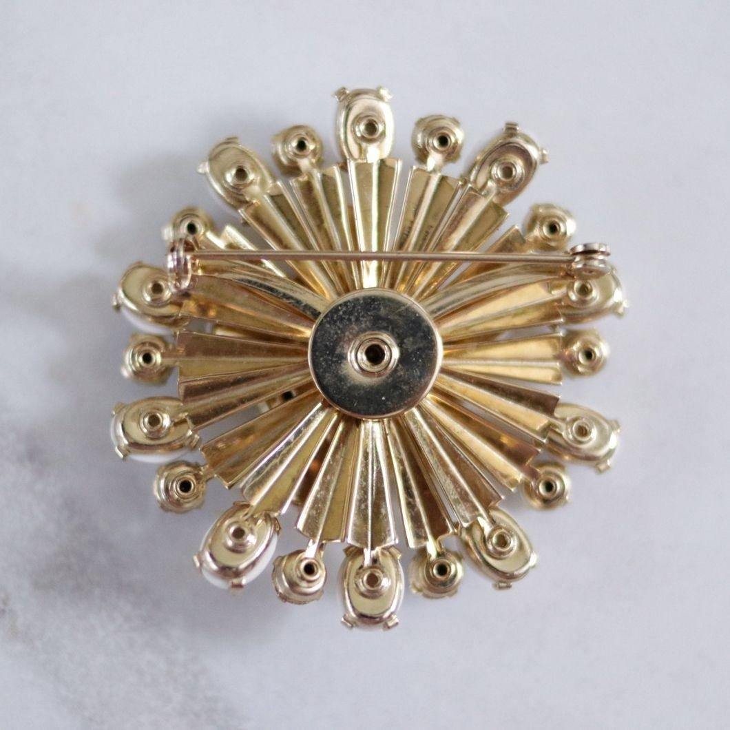 Vintage Milk Glass and Blue Rhinestone Pinwheel Brooch by Unsigned Beauty - Vintage Meet Modern Vintage Jewelry - Chicago, Illinois - #oldhollywoodglamour #vintagemeetmodern #designervintage #jewelrybox #antiquejewelry #vintagejewelry