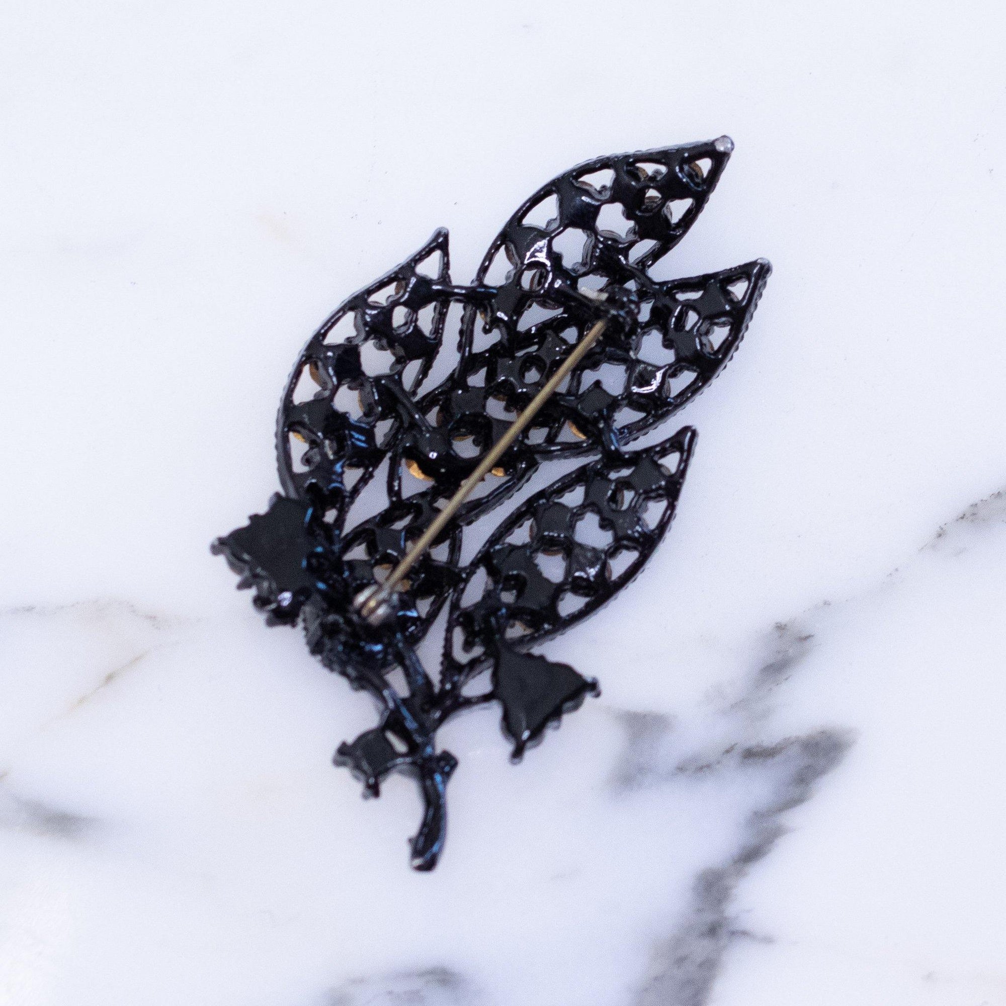 Vintage Jet Crystal Rhinestone Brooch by Austria - Vintage Meet Modern Vintage Jewelry - Chicago, Illinois - #oldhollywoodglamour #vintagemeetmodern #designervintage #jewelrybox #antiquejewelry #vintagejewelry