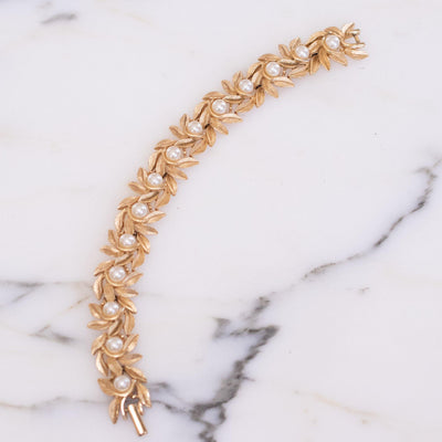 Vintage Avon Faux Pearl and Gold Leaf Link Bracelet by Avon - Vintage Meet Modern Vintage Jewelry - Chicago, Illinois - #oldhollywoodglamour #vintagemeetmodern #designervintage #jewelrybox #antiquejewelry #vintagejewelry