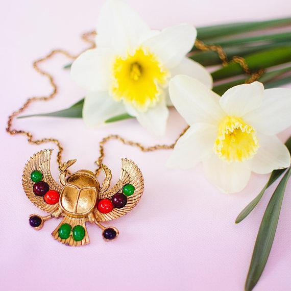 Gold tone Tutankhamun Winged Falcon Scarab Statement Necklace by Falcon Scarab - Vintage Meet Modern Vintage Jewelry - Chicago, Illinois - #oldhollywoodglamour #vintagemeetmodern #designervintage #jewelrybox #antiquejewelry #vintagejewelry