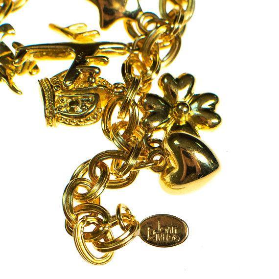 Vintage Joan Rivers Gold Tone Loaded Charm Bracelet by Joan Rivers - Vintage Meet Modern Vintage Jewelry - Chicago, Illinois - #oldhollywoodglamour #vintagemeetmodern #designervintage #jewelrybox #antiquejewelry #vintagejewelry