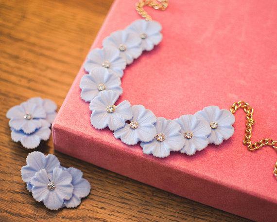 Blue Lucite Flower Clip On Earrings with Pale Blue Rhinestone by 1950s - Vintage Meet Modern Vintage Jewelry - Chicago, Illinois - #oldhollywoodglamour #vintagemeetmodern #designervintage #jewelrybox #antiquejewelry #vintagejewelry