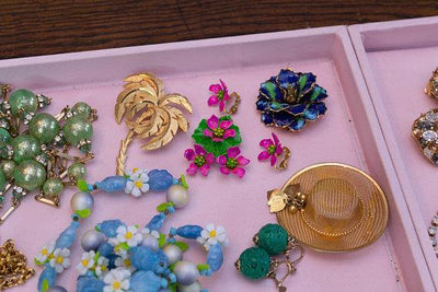 Vintage Metallic Pink Flower Brooch, Green Painted Leaf, Yellow and Green Center by 1950s - Vintage Meet Modern Vintage Jewelry - Chicago, Illinois - #oldhollywoodglamour #vintagemeetmodern #designervintage #jewelrybox #antiquejewelry #vintagejewelry