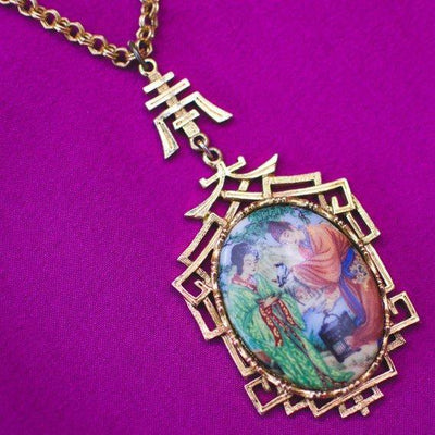 Vintage 1960s Asian Garden Scene Necklace with Geisha, Statement Necklace, Long Pendant by 1960s - Vintage Meet Modern Vintage Jewelry - Chicago, Illinois - #oldhollywoodglamour #vintagemeetmodern #designervintage #jewelrybox #antiquejewelry #vintagejewelry