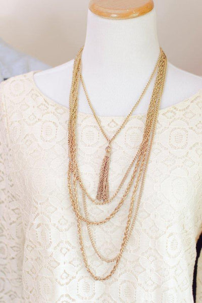 Gold tone multi chain necklace with center tassel pendant by 1960s - Vintage Meet Modern Vintage Jewelry - Chicago, Illinois - #oldhollywoodglamour #vintagemeetmodern #designervintage #jewelrybox #antiquejewelry #vintagejewelry