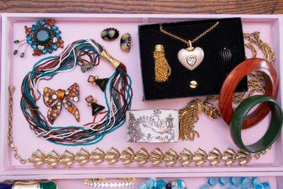 Vintage Rhinestone Bow Brooch Amber, Citrine, Golden Yellow Rhinestones Black Japanned Metal Setting by 1960s - Vintage Meet Modern Vintage Jewelry - Chicago, Illinois - #oldhollywoodglamour #vintagemeetmodern #designervintage #jewelrybox #antiquejewelry #vintagejewelry