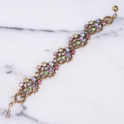 Vintage Lisner Gold Leaf Bracelet with Pink, Purple, Green, and Blue Rhinestones by Lisner - Vintage Meet Modern Vintage Jewelry - Chicago, Illinois - #oldhollywoodglamour #vintagemeetmodern #designervintage #jewelrybox #antiquejewelry #vintagejewelry