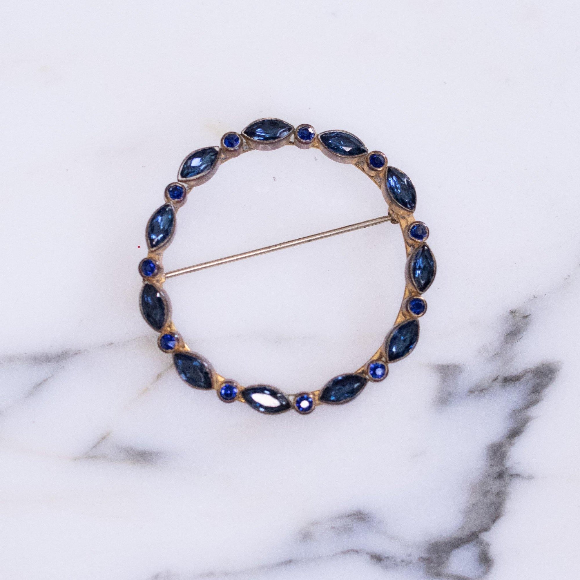 Vintage Victorian Era Sapphire Blue Round Crystal Brooch by Vintage Meet Modern - Vintage Meet Modern Vintage Jewelry - Chicago, Illinois - #oldhollywoodglamour #vintagemeetmodern #designervintage #jewelrybox #antiquejewelry #vintagejewelry