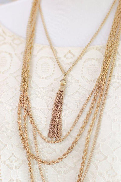 Gold tone multi chain necklace with center tassel pendant by 1960s - Vintage Meet Modern Vintage Jewelry - Chicago, Illinois - #oldhollywoodglamour #vintagemeetmodern #designervintage #jewelrybox #antiquejewelry #vintagejewelry