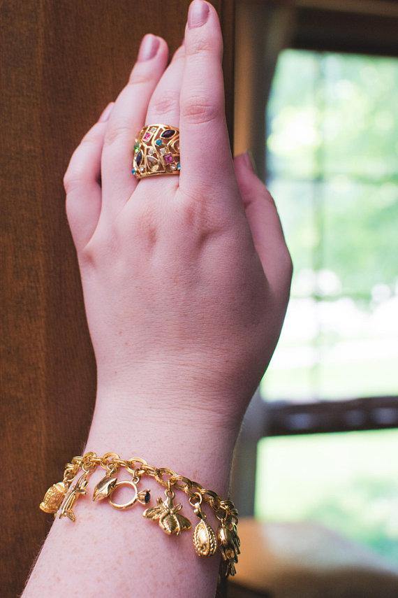 Vintage Joan Rivers Gold Tone Loaded Charm Bracelet by Joan Rivers - Vintage Meet Modern Vintage Jewelry - Chicago, Illinois - #oldhollywoodglamour #vintagemeetmodern #designervintage #jewelrybox #antiquejewelry #vintagejewelry