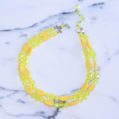 Vintage Double Strand Yellow Bead Necklace by Made in Hong Kong - Vintage Meet Modern Vintage Jewelry - Chicago, Illinois - #oldhollywoodglamour #vintagemeetmodern #designervintage #jewelrybox #antiquejewelry #vintagejewelry