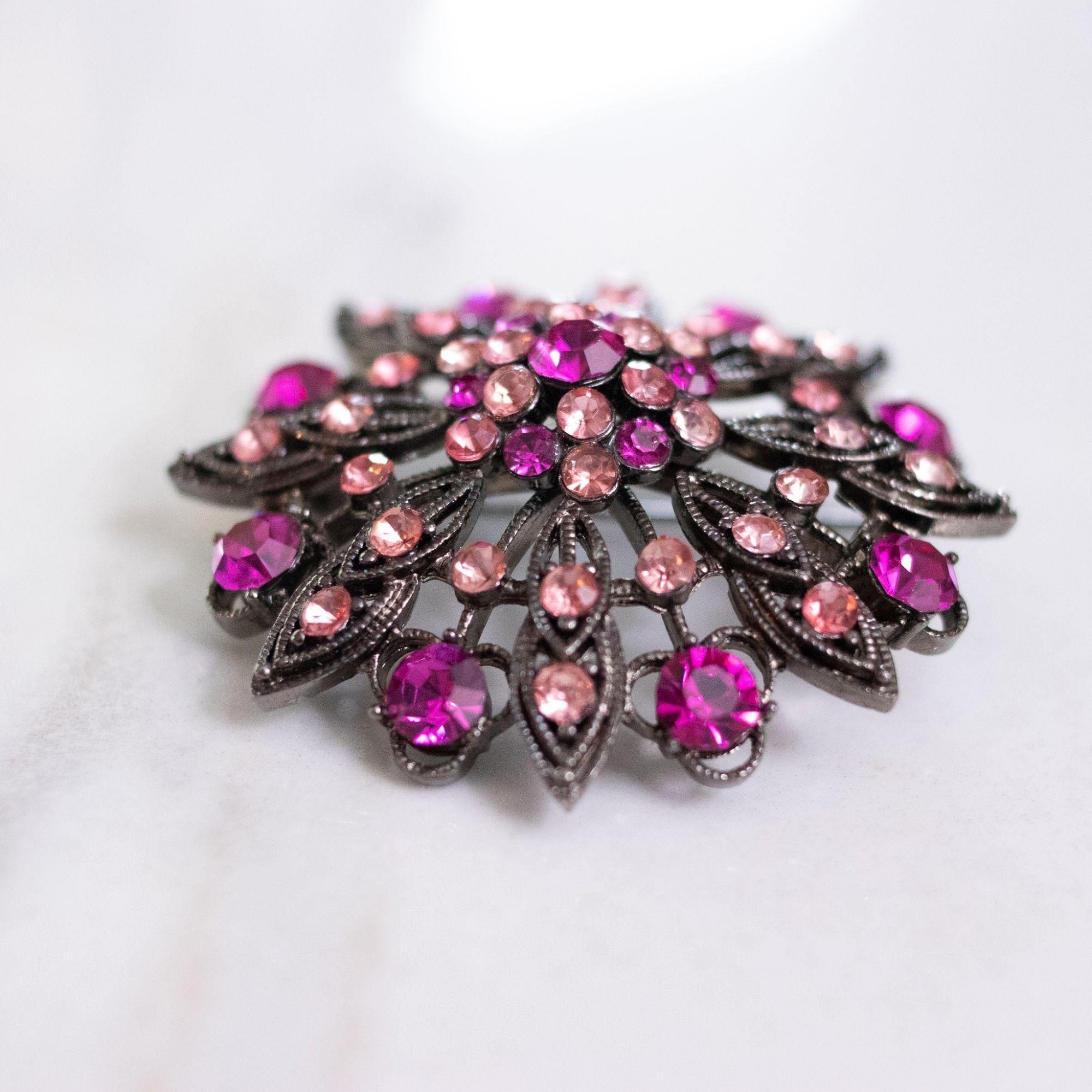 Vintage Pink Rhinestone Pinwheel Medallion Brooch by Unsigned Beauty - Vintage Meet Modern Vintage Jewelry - Chicago, Illinois - #oldhollywoodglamour #vintagemeetmodern #designervintage #jewelrybox #antiquejewelry #vintagejewelry