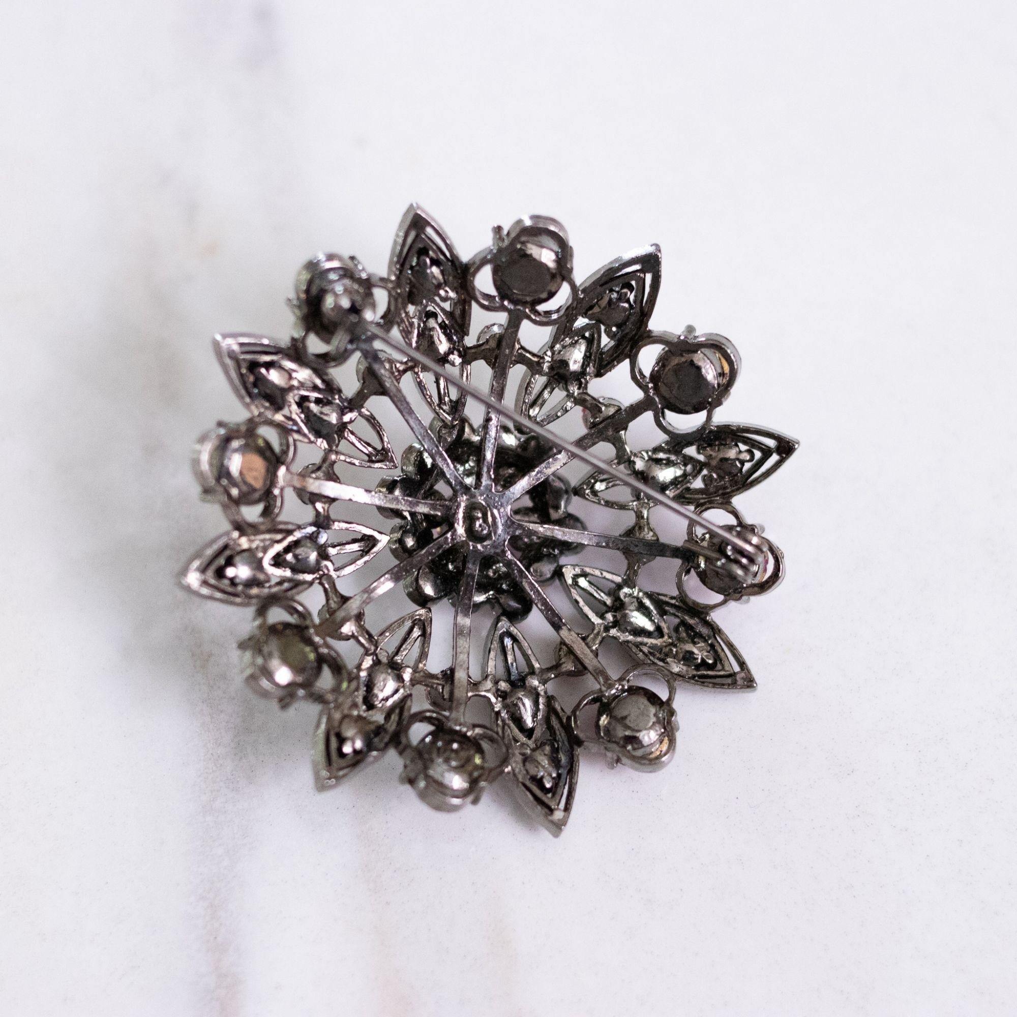 Vintage Pink Rhinestone Pinwheel Medallion Brooch by Unsigned Beauty - Vintage Meet Modern Vintage Jewelry - Chicago, Illinois - #oldhollywoodglamour #vintagemeetmodern #designervintage #jewelrybox #antiquejewelry #vintagejewelry